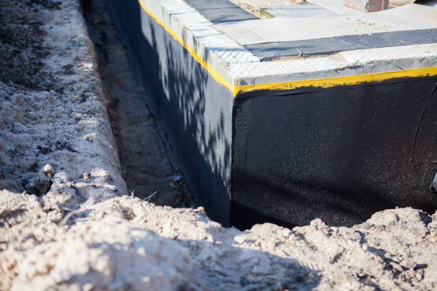 Professional Waterproofing technician working in Brooklyn, OH